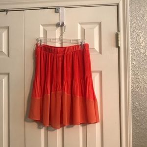 Never worn orange/coral skirt!